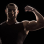 man flexing bicep