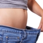 woman showing off weight loss