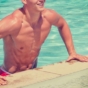 man climbing out of pool