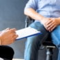 man speaking with doctor