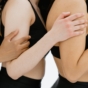 a group of women in a line embracing