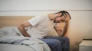 A man having a headache after taking Viagra (sildenafil)