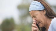 Woman sneezing
