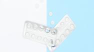 Pills on blue and white background